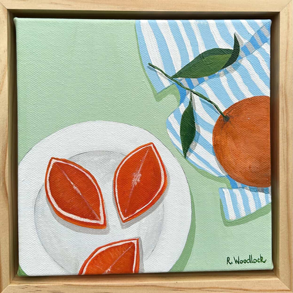 Artistic representation of orange slices and fruit.